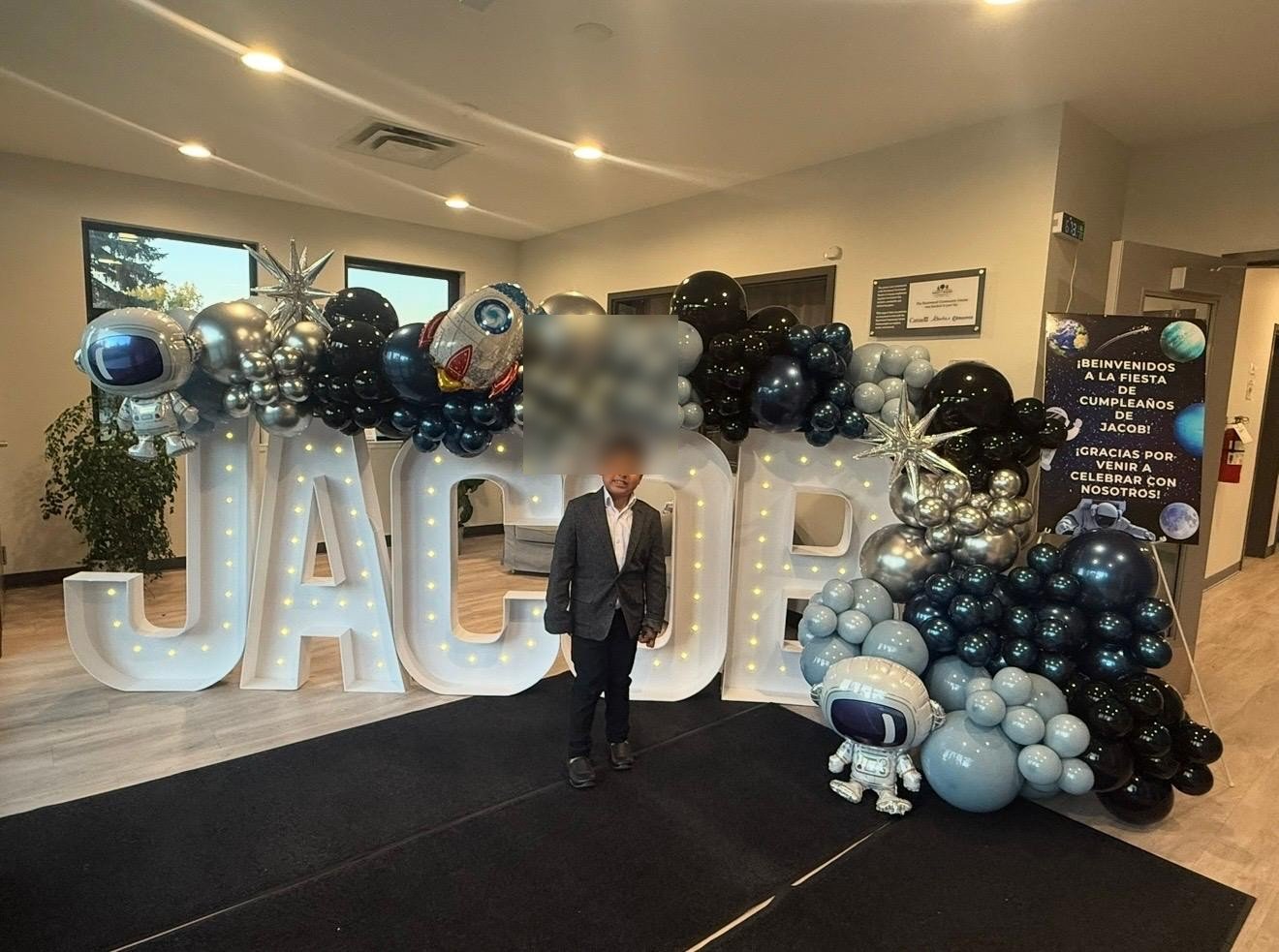 JACOB marquee letters with space balloon arch